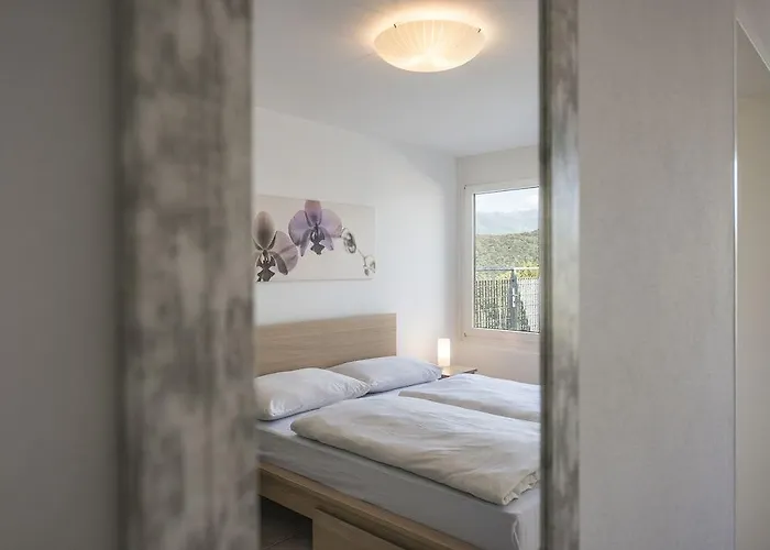 מלון דירות Centro Cadro Panoramica 4*